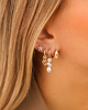 Earparty met steentjes goudkleurig