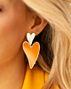 Koningsdag oorbellen bij model