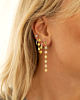 Gouden earparty met bloemen