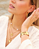 Gouden sieraden look