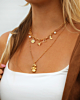 Gouden necklaceparty met bedels