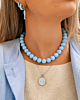 Necklaceparty met blauwe kralen en initialen
