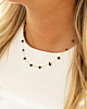 goudkleurige ketting met zwarte steentjes
