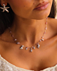 Zilveren bedelketting roze steentjes