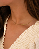 Sideways love heart ketting goud