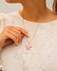 Gouden zeester ketting roze