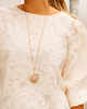 Lange gouden ketting met zon