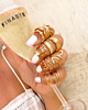 Gouden ringparty met roze details