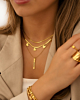 Bar ketting met steentje goud