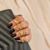 Gouden ringen mix om hand