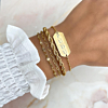 Trendy schakelarmbandjes om de pols voor een complete look