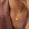 Gouden ketting met gravering in hartjes vorm