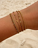 gouden mix van verschillende schakelarmbandjes