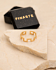 Gouden blokjes ring met sieradendoosje