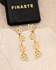 Gouden statement oorbellen met blaadjes