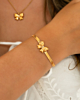 Gouden snake armband met strik