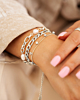 ilveren armparty met parels