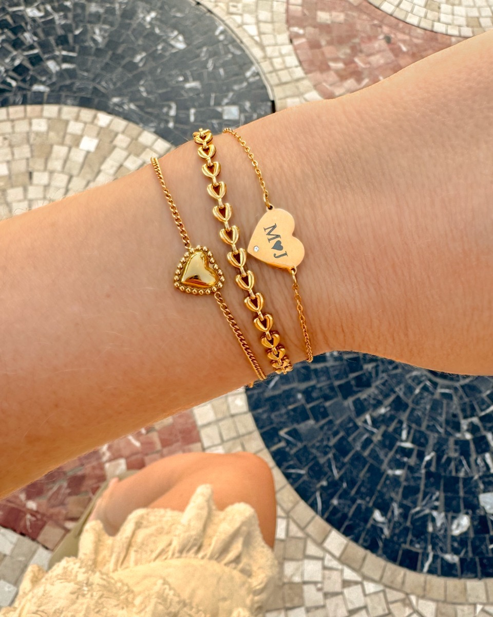Gouden armparty met hartjes