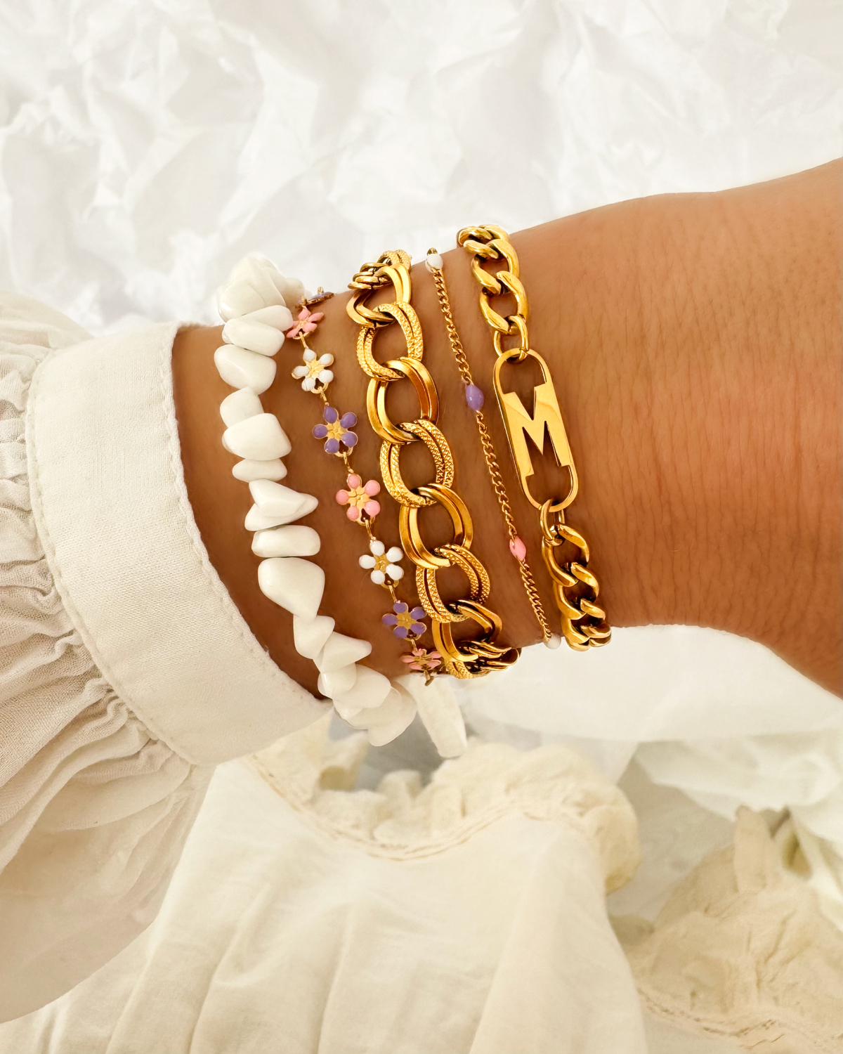 Gouden armparty met kleurtjes