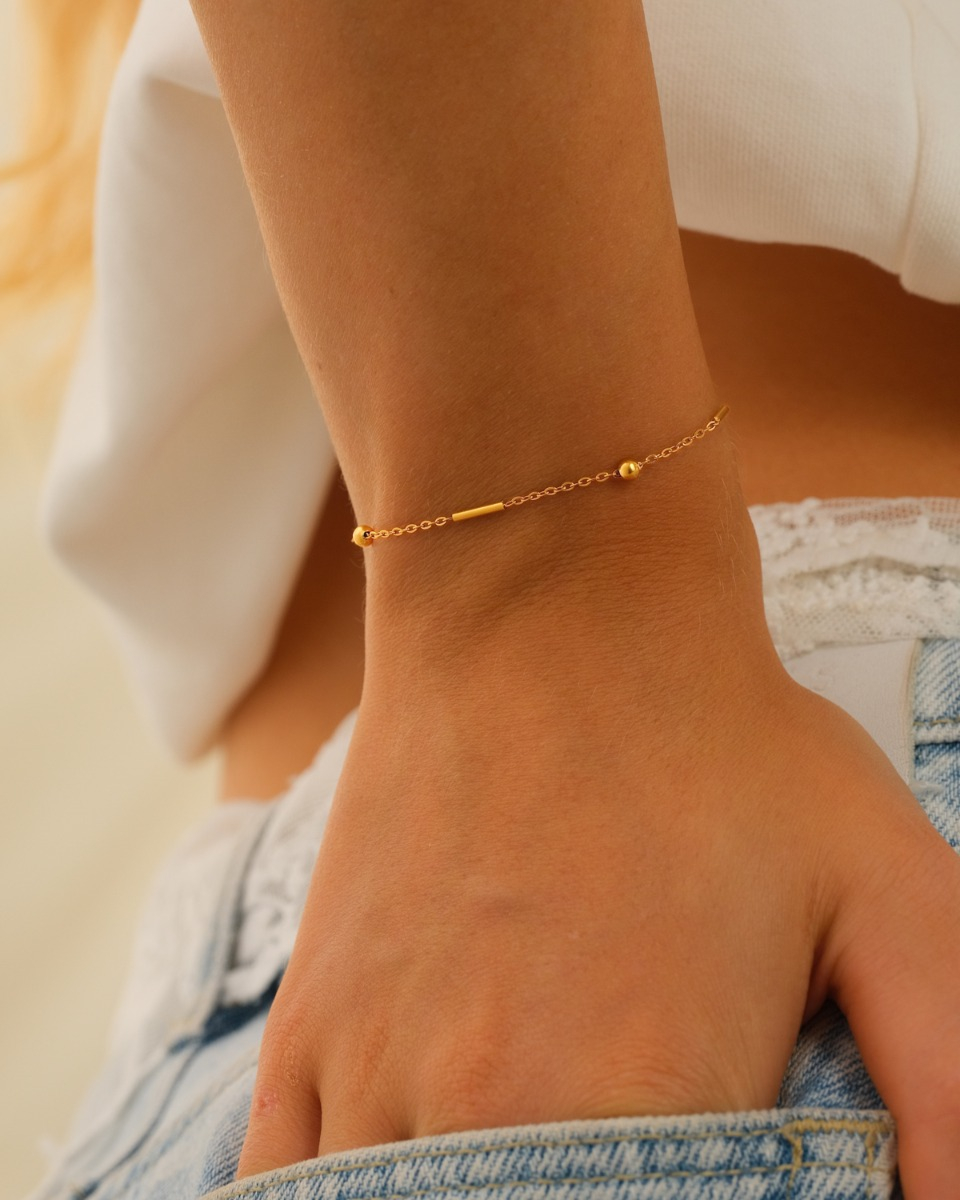 Armband met subtiele bolletjes & tubes goud
