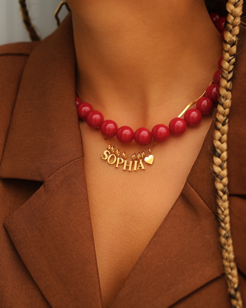 Necklaceparty met kralen ketting en initialen ketting
