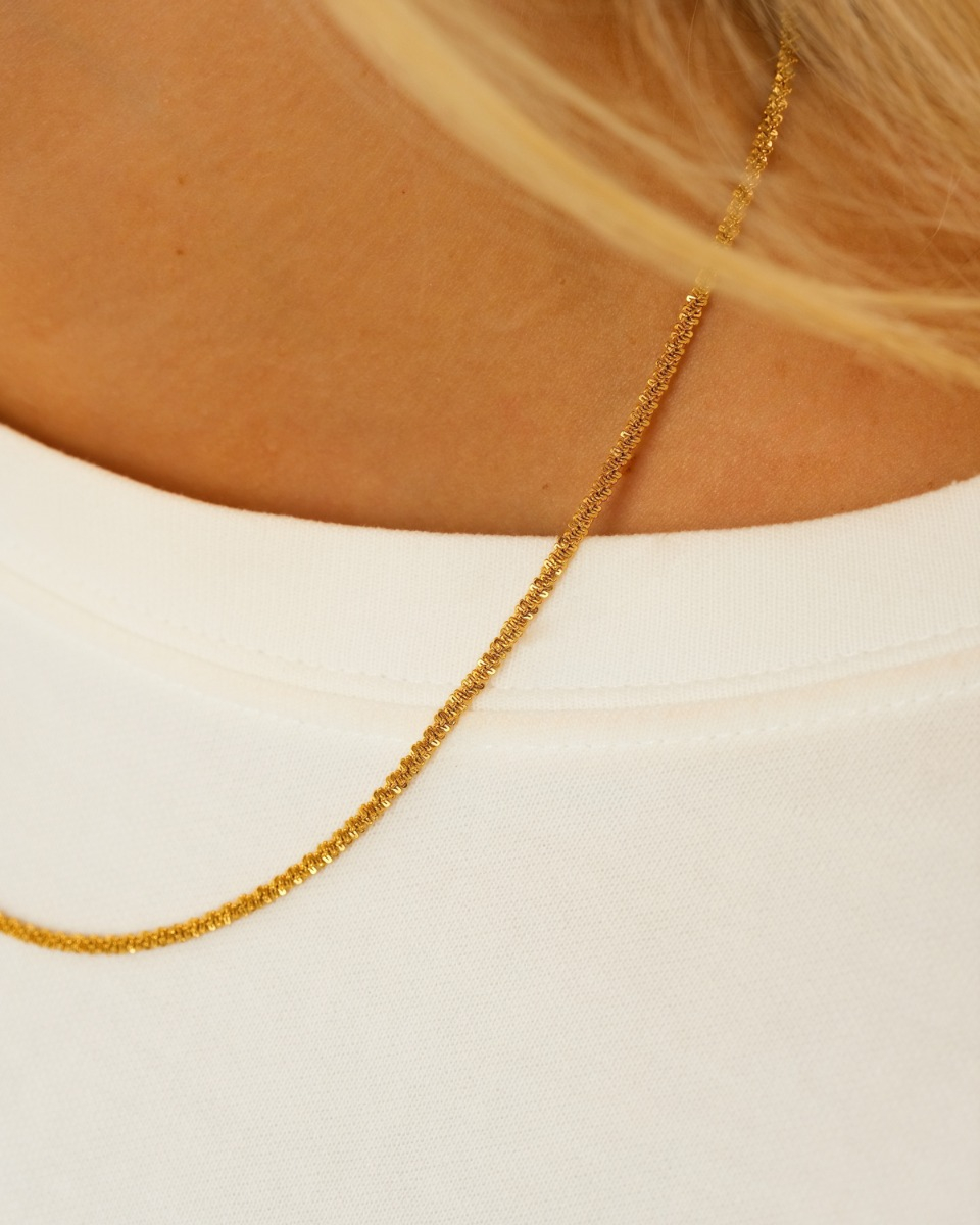 Gouden ketting gedraaid