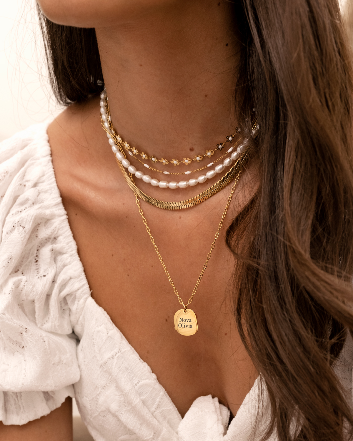 Platte snake ketting goudkleurig