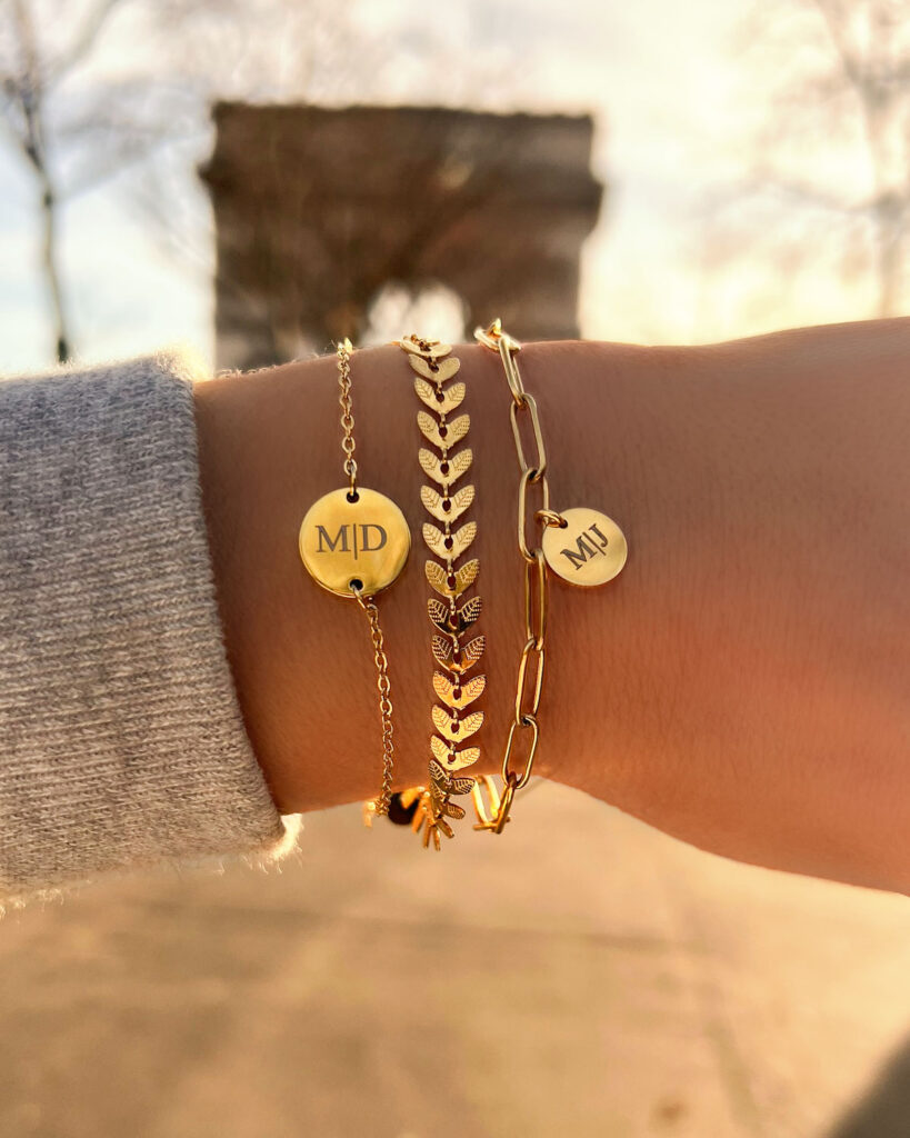 gouden armparty met initials